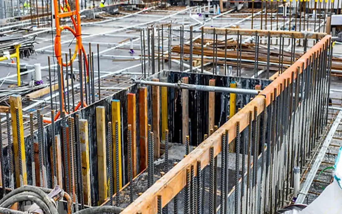 Workers tightening support ties 2